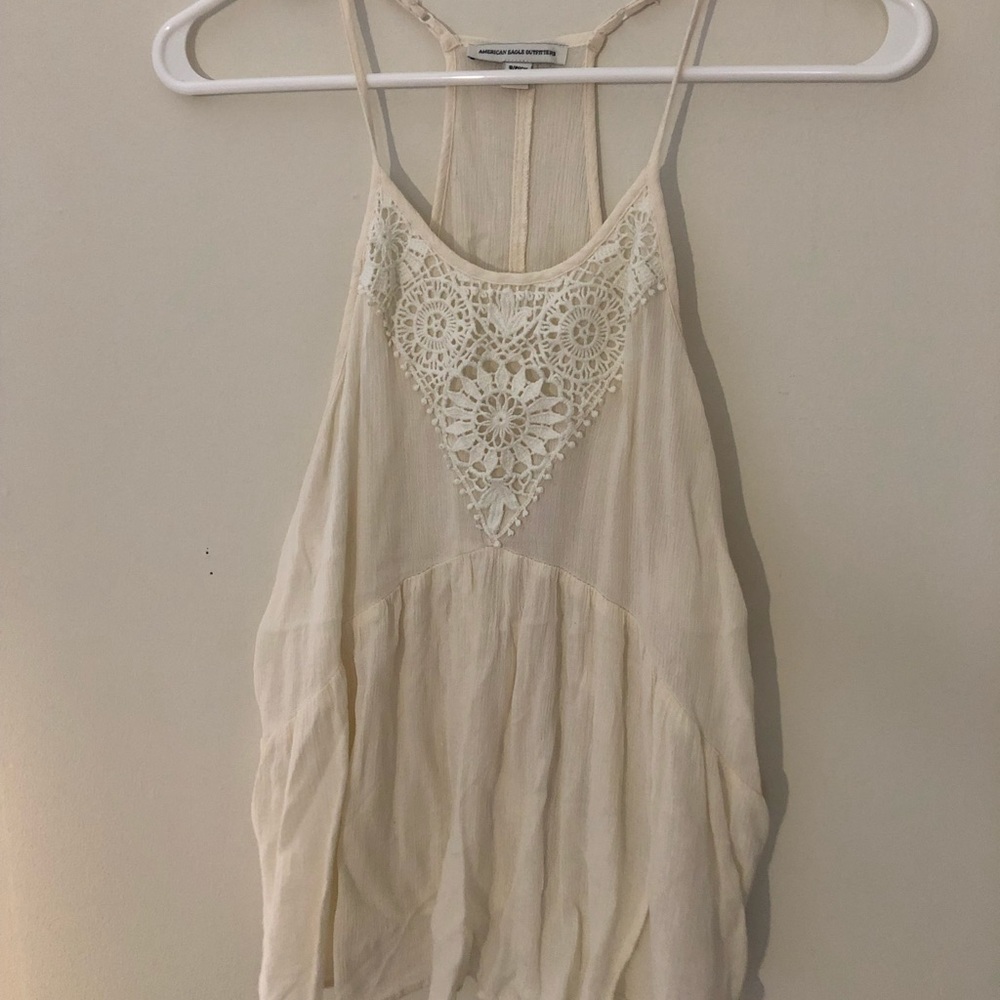 Cream tank top with floral pattern